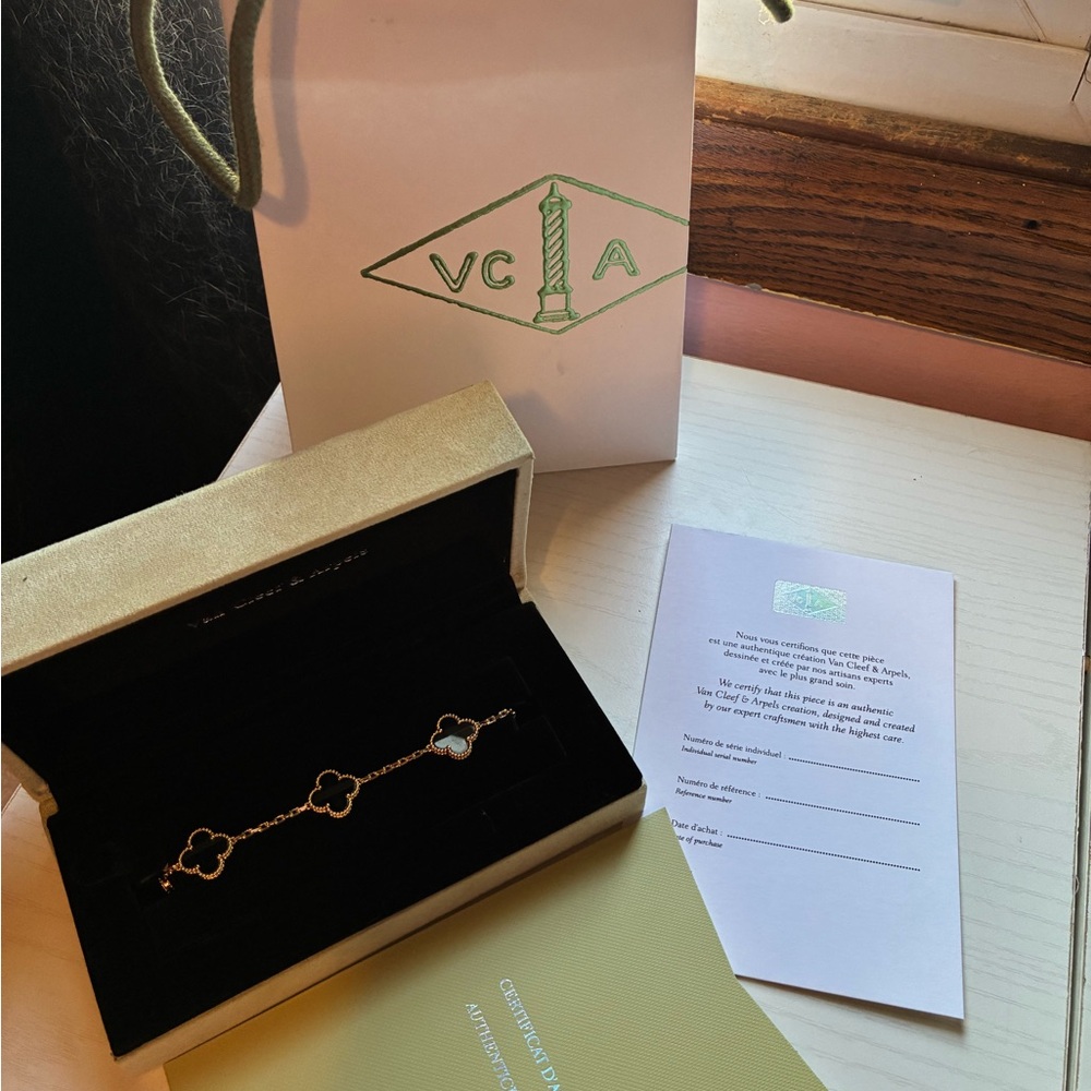 Van Cleef & Arpels Black and Gold Clover Bracelet